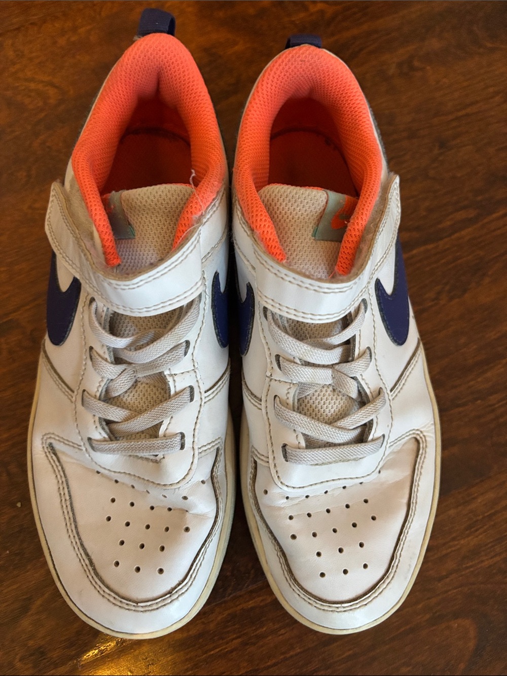 Nike Kids White Sneakers with Blue Swoosh and Orange Lining